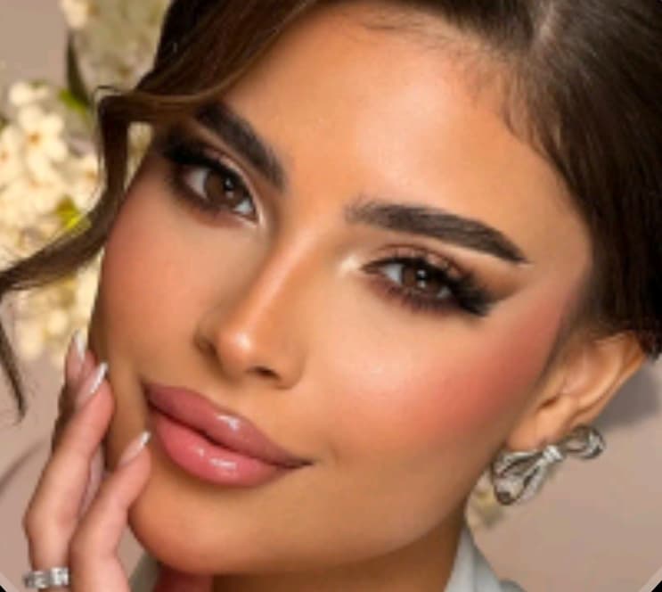 FATMA AL-MUJAINI